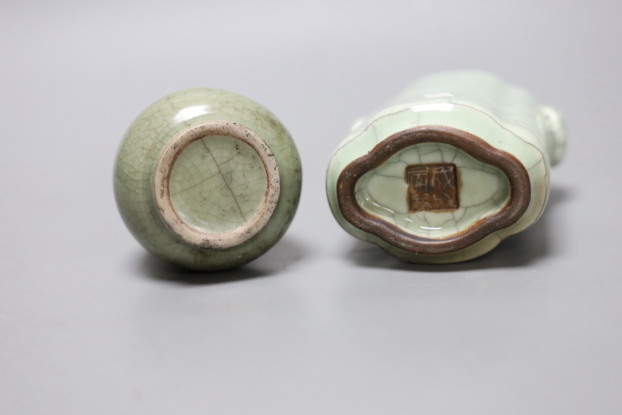 A Chinese celadon bottle vase, and a celadon crackle glaze vase, Yuan-Ming or later, 14cm